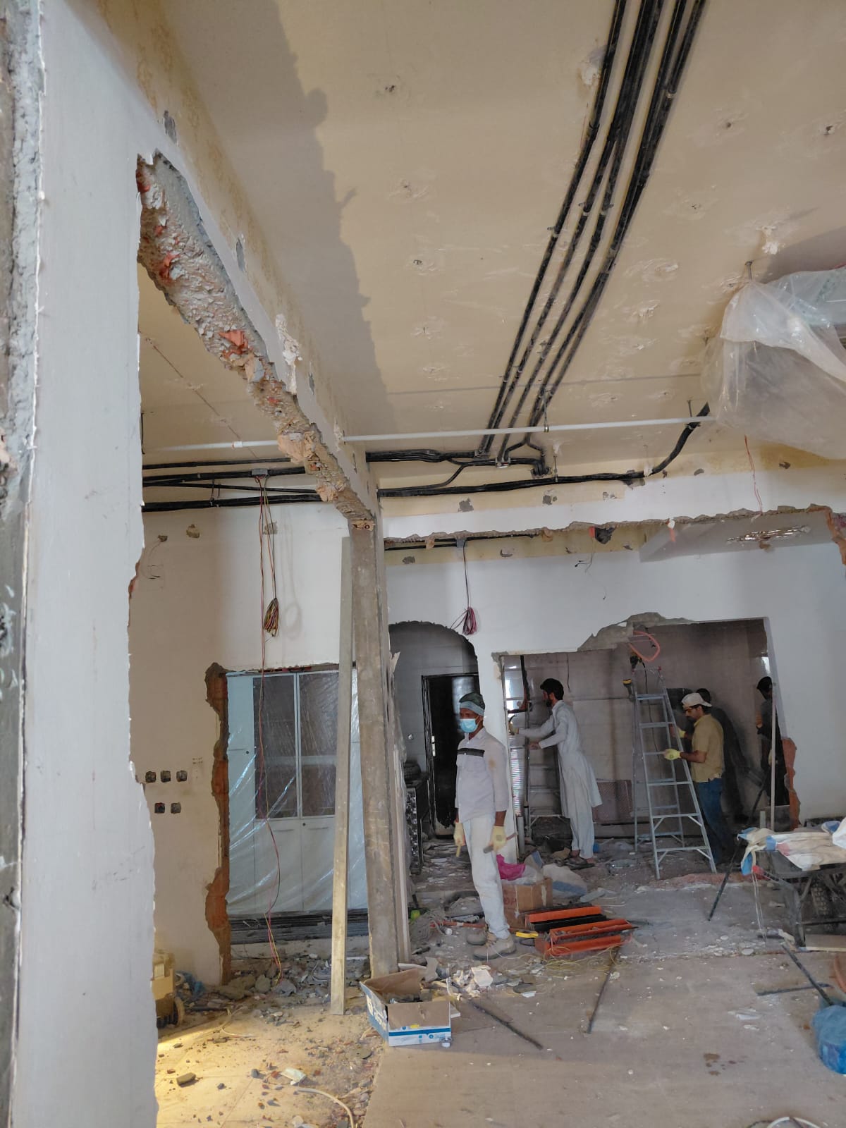 Office remodeling Riyadh - construction workers on site